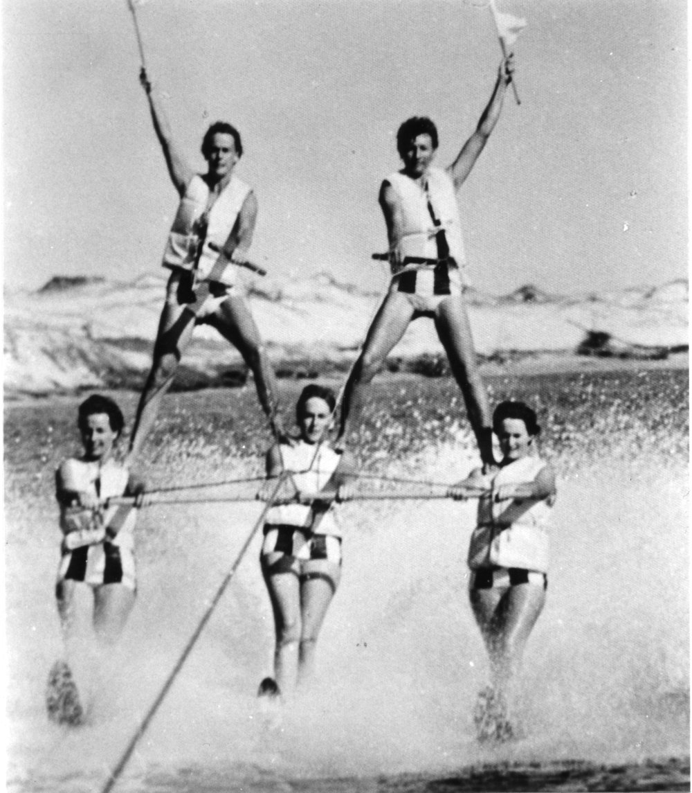 The ballet team of female water skiers in a performance of the Pyramid at North Beach, early 1960s