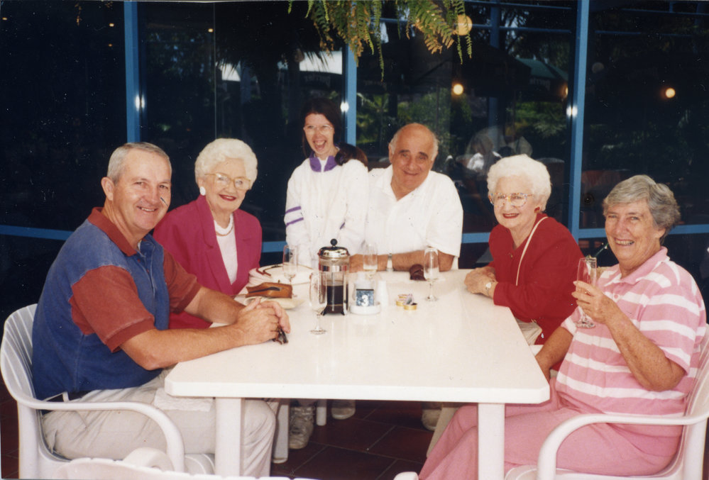 Adelie and Toni "Breakfast on the beach" at Pelican Beach with Bernie and Patricia Malouf, c. 1994