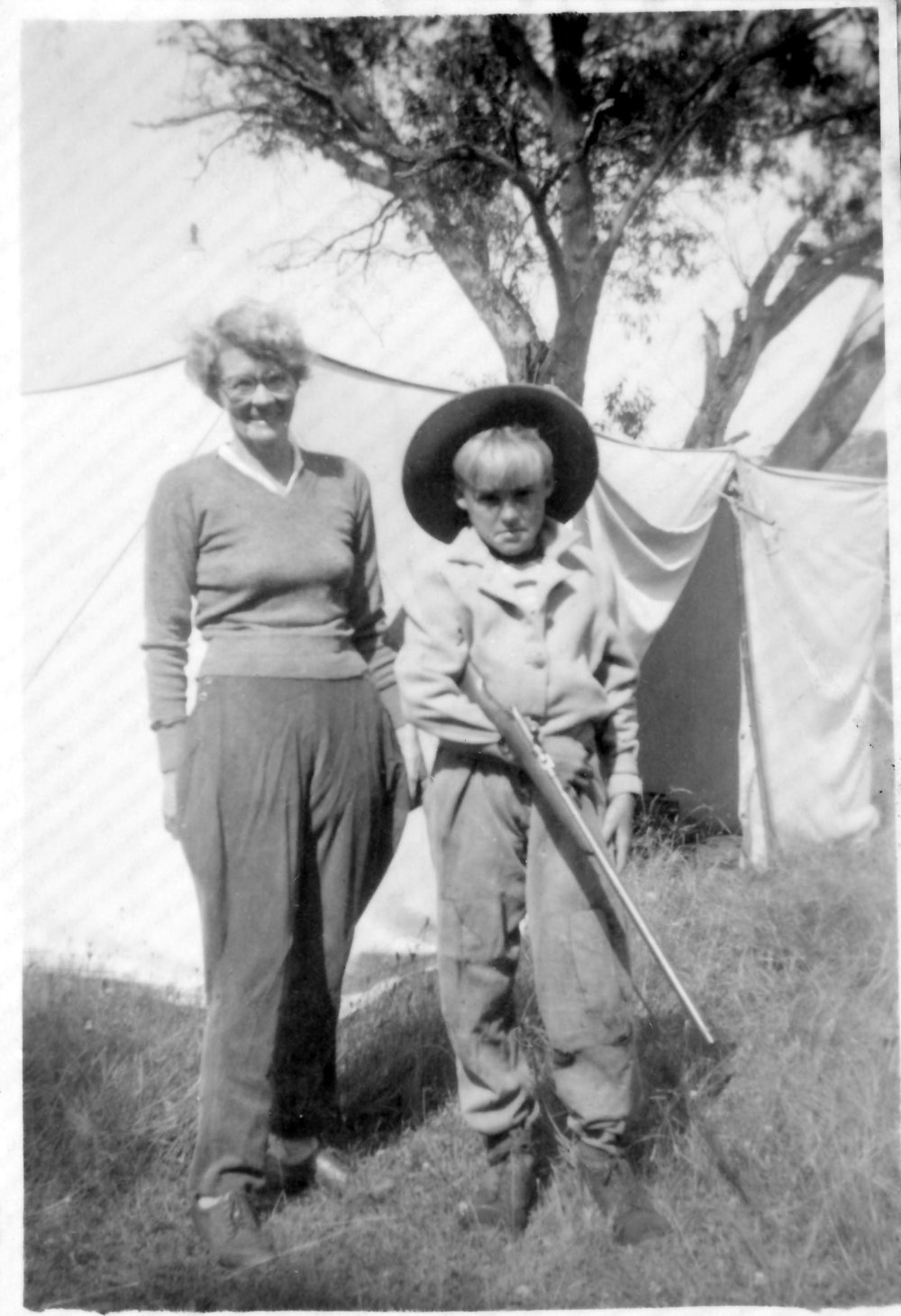 Betty and Hugh Nicol go rabbit hunting, 1950s 
