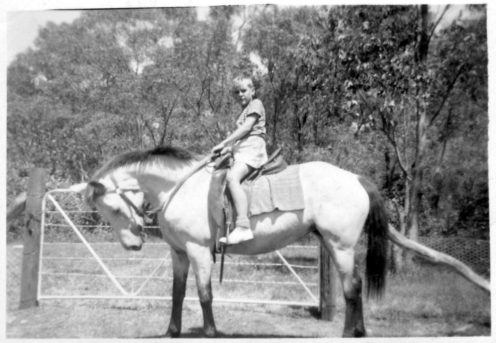 Hugh Nicol riding Bruce Miller's horse at "Lochnagar", early 1950s 