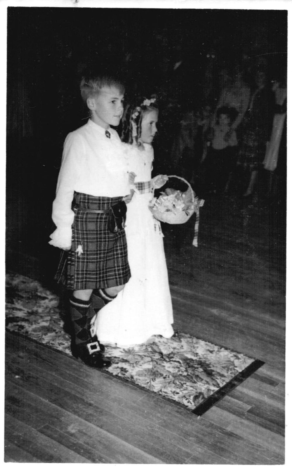 Page boy Hugh Nicol and flower girl Robin Bailey at the Scottish Ball in the School of Arts, July 1953