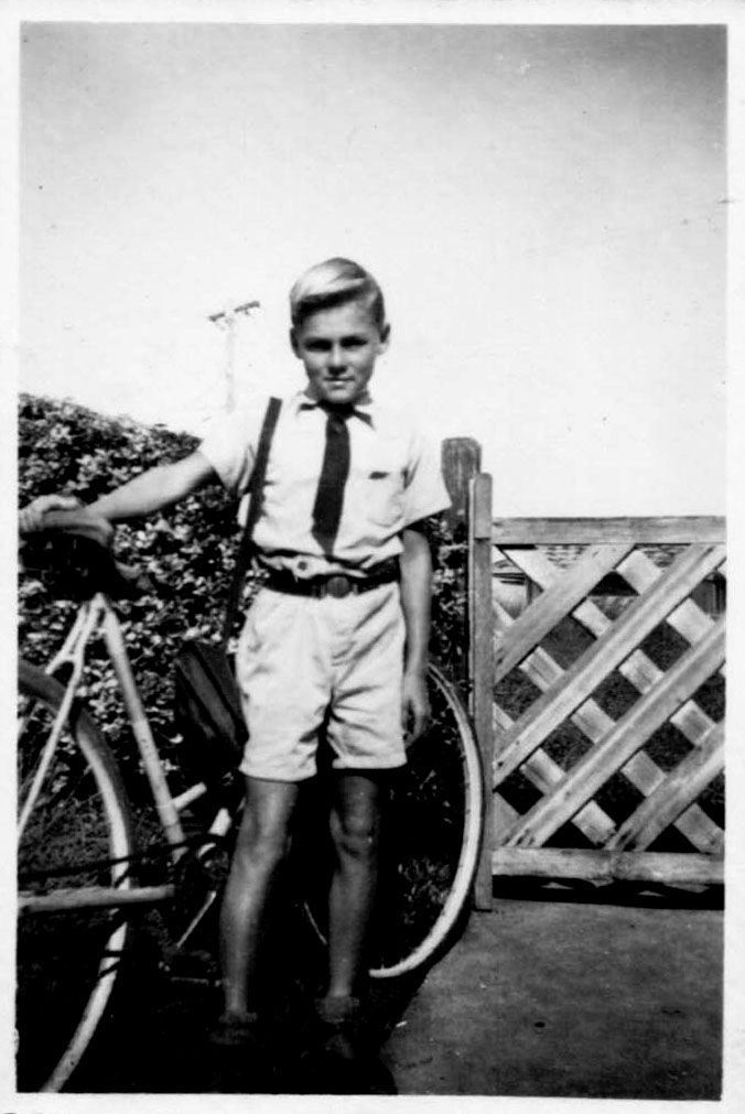 Hugh Nicol ready to leave for school from Solitary Street, 1950s