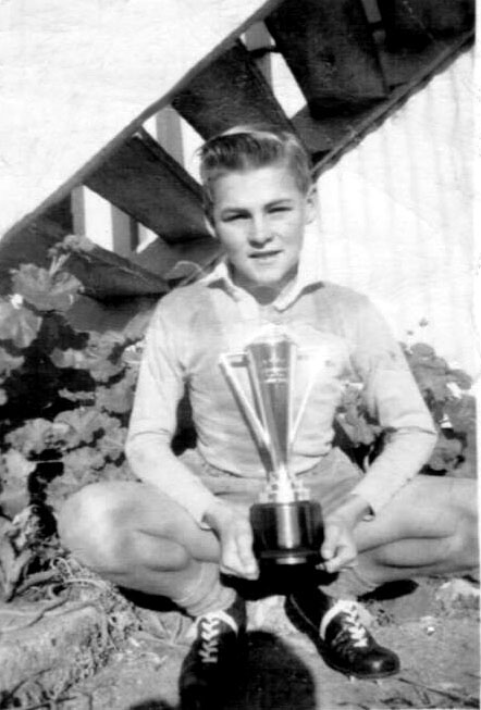 Hugh Nicol with the trophy won by Coffs Harbour High in a Kempsey knock-out football carnival, 1956
