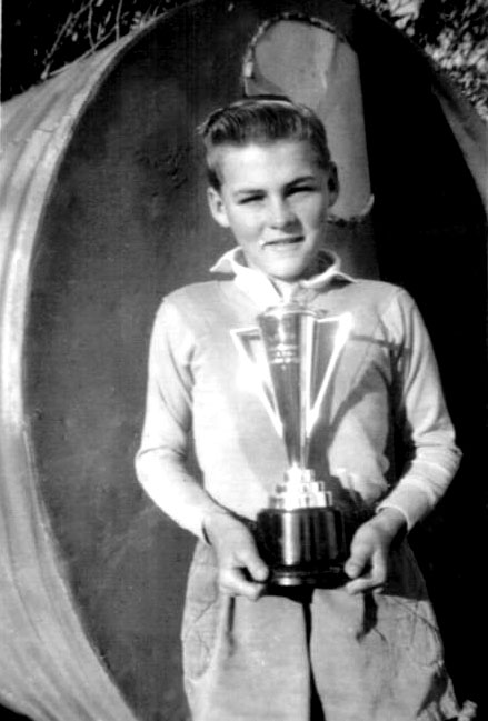 Hugh Nicol with the trophy won by Coffs Harbour High in a Kempsey knock-out football carnival, 1956