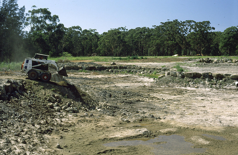 Building the lake's edge in the North Coast Regional Botanic Garden