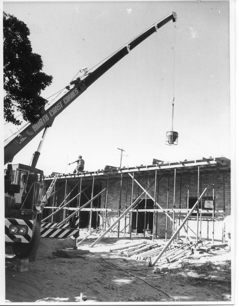 Continuing construction of the Sawtell Surf Clubhouse with North Coast Cranes, 1982 