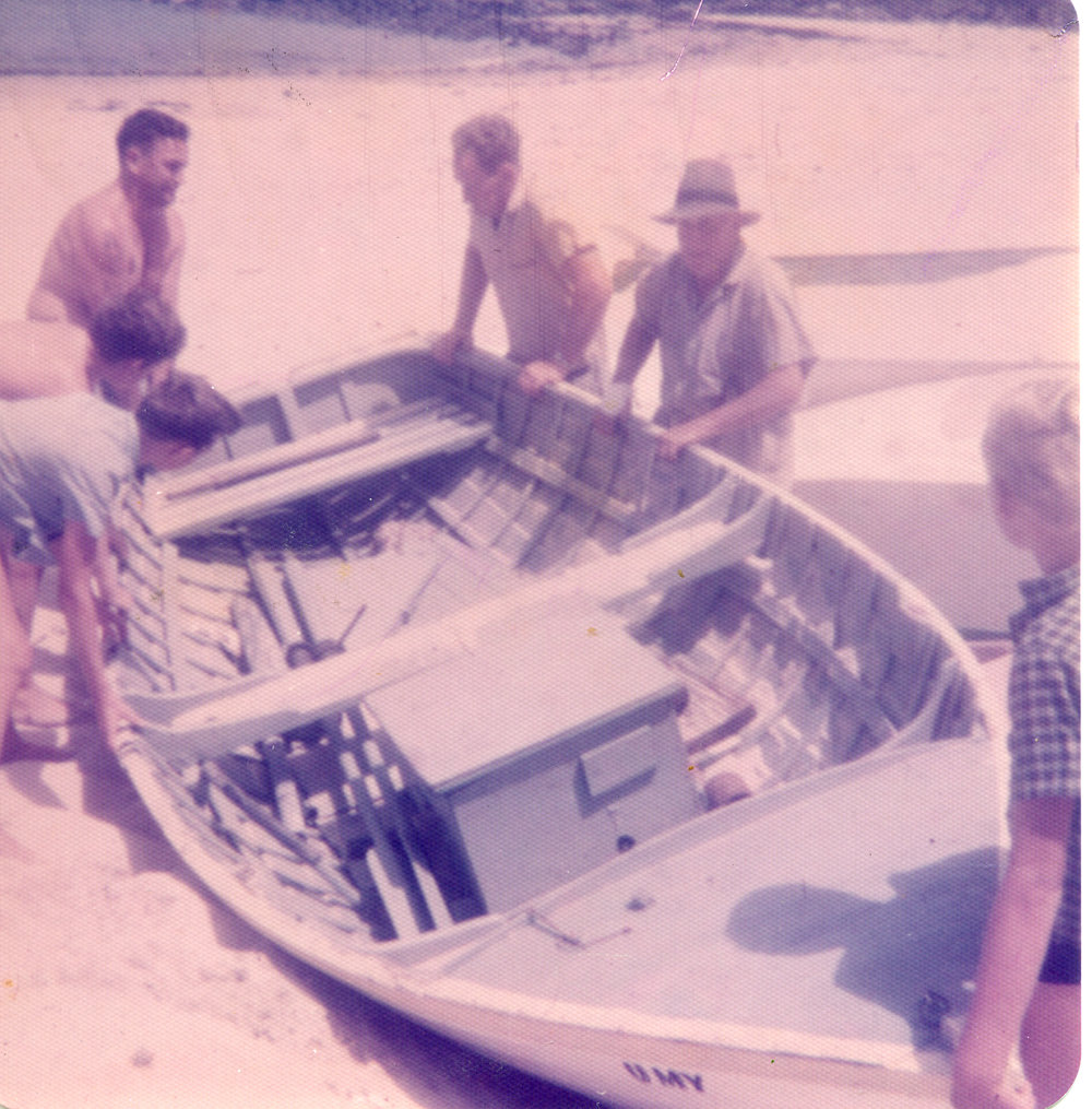 Bailey family with fishing boat at the bay in Sawtell