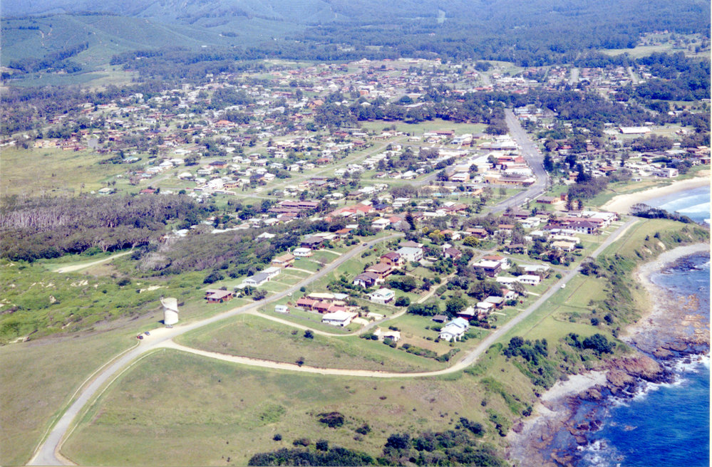 Aerial view of Woolgoolga Headland looking west, 1992 - 1994 
