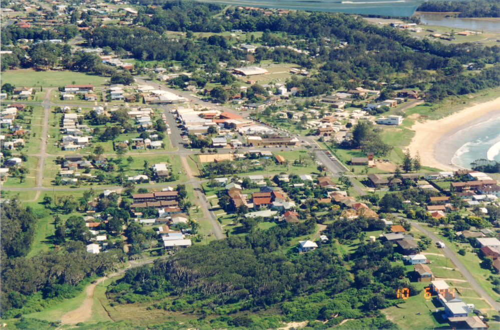 Aerial view of Woolgoolga township, 10 June 1994 