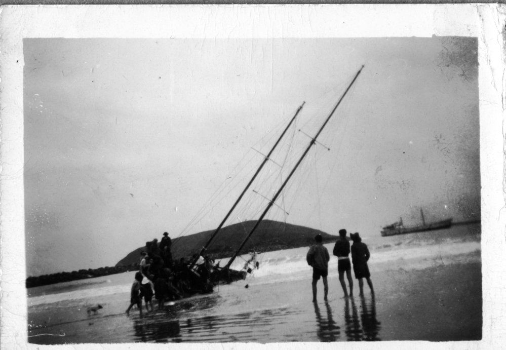 A beached boat on Jetty Beach, 24 June 1950