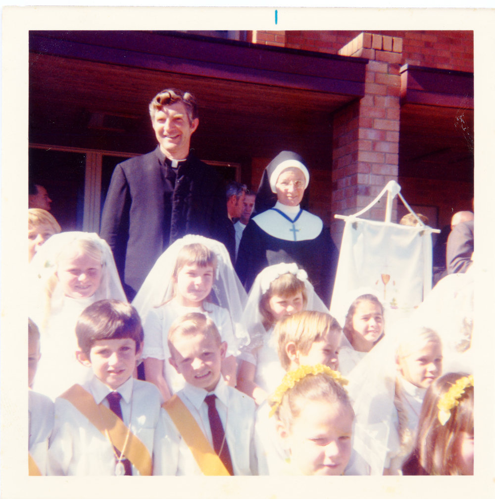 Father Tony Casey and Sister Evangelista with First Communion children at St Augustine's School, 20 August 1972 
