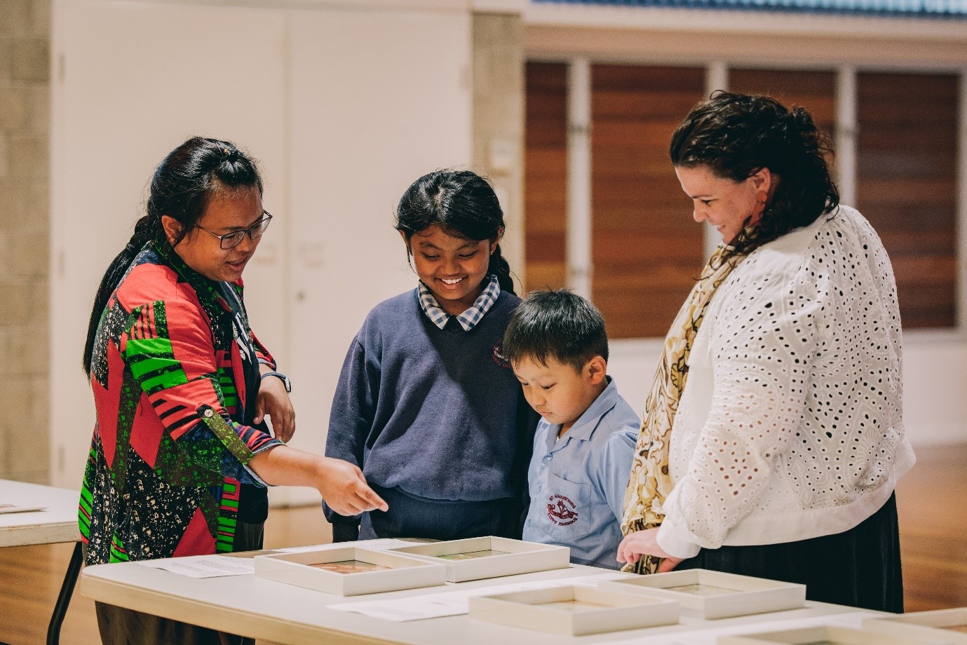 Community Curator Emma Aspden with contributors from the multicultural community