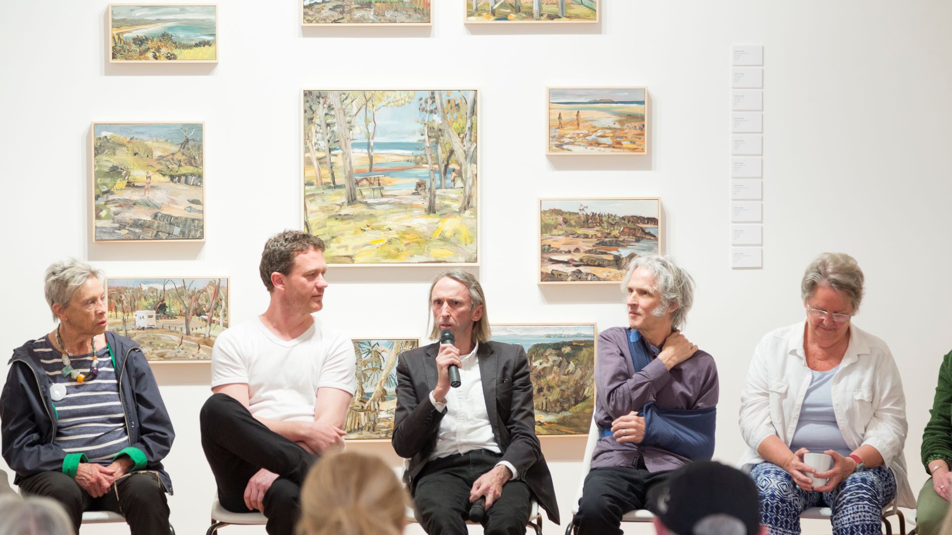 Reg Mobassa during an artists' talk