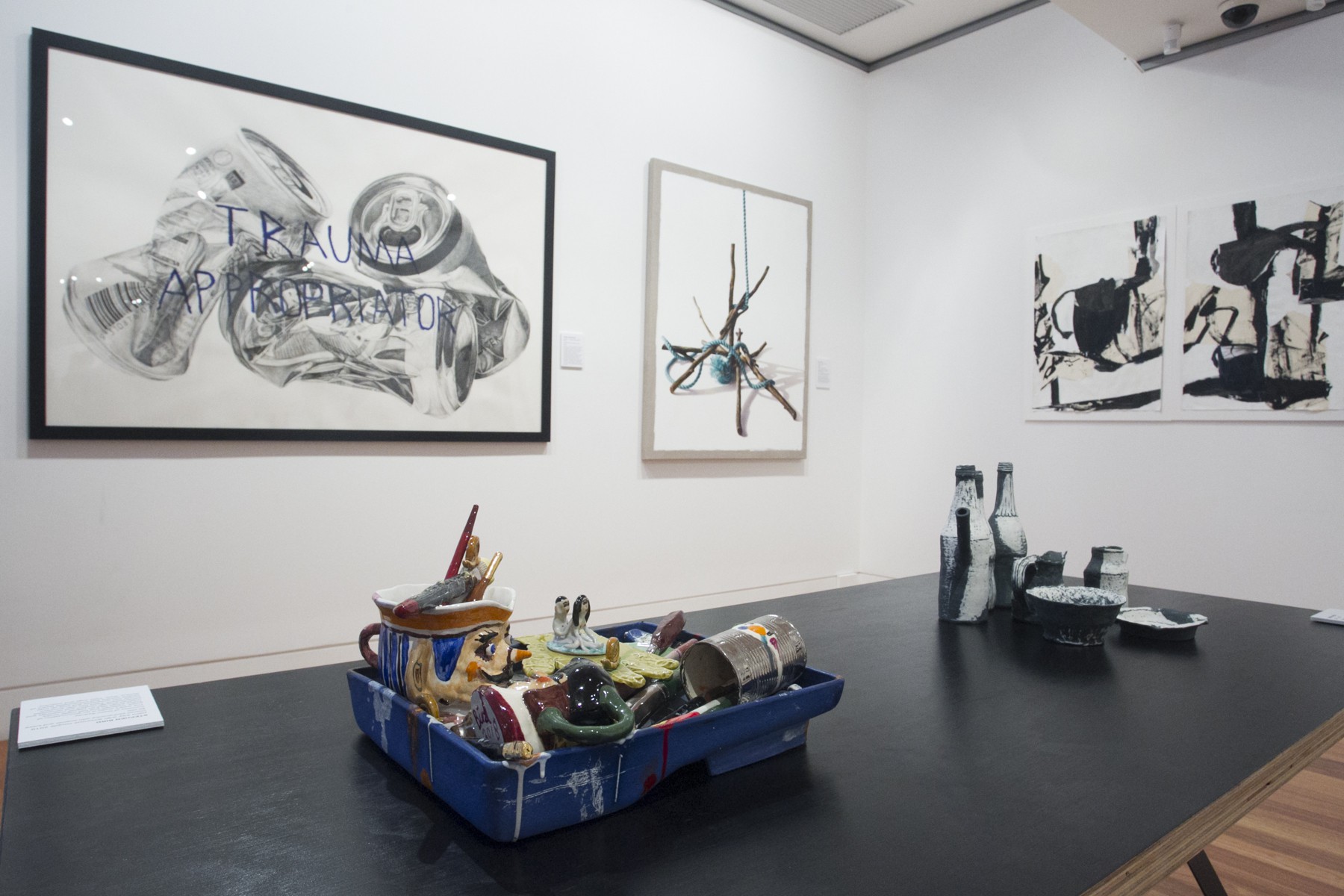 Works on wall by (l to r): Daniel Sherington, Jane James and Susan Jacobsen. Works on table by (l to r): Stephen Bird and Gerry Wedd