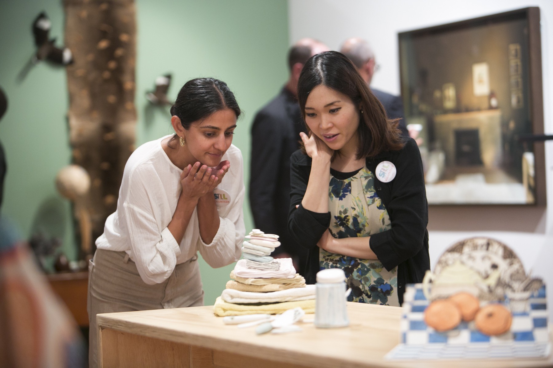 Visitors study Honor Freeman's 'Small acts of care'