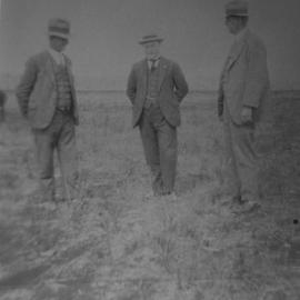 Charles Vost, Bill Cox and R. H. Bartlett inspect the Aerodrome airstrip, c. 1930
