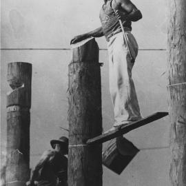 Leo Appo in the final of a woodchopping competition, 1927 