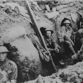 Soldiers sitting in a trench during World War I, 1917