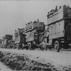 Soldiers being transported by buses during World War I, 1917