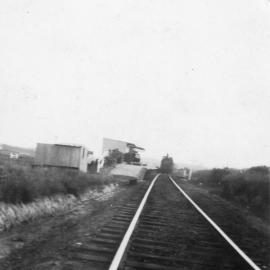 A steam train pulling into Sawtell Railway Station, c. 1940