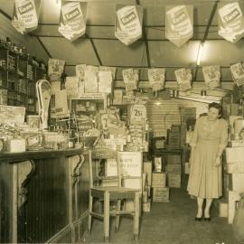 Edna Bray and Del Berriman inside Bray's Store, 1956 
