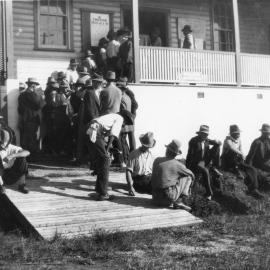 Men collecting dole tickets from the Coffs Harbour Police Station