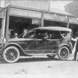 Coffs Harbour to Grafton Passenger Car in front of Hardy's Newsagent, c.1920