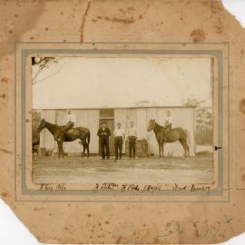 Railway construction workers outside a shed, c.1914