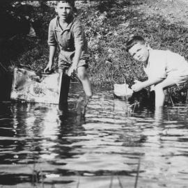 Harlie and Ian Eckford at play in the creek, March 1929