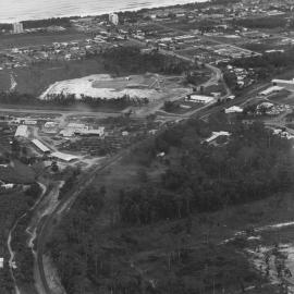 Allen Taylor's sawmill with Park Beach Plaza in an early construction stage, 6 March 1979