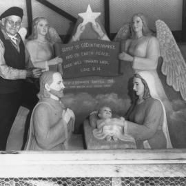 John Suchomlin with his sand models carved at Sawtell Reserve, 1962 