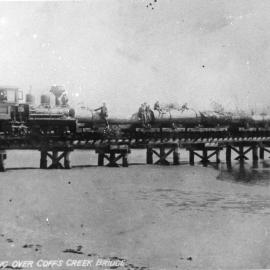 Log hauling over Coffs Creek railway bridge, 1910
