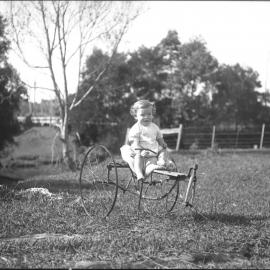 Jack Hills on a tricycle, 1922