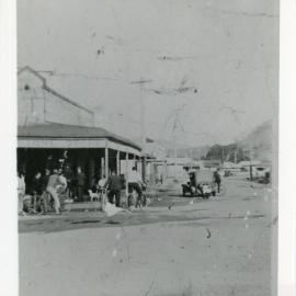 Cyclists at Bray's Corner at West High Street and Moonee Street, c.1920