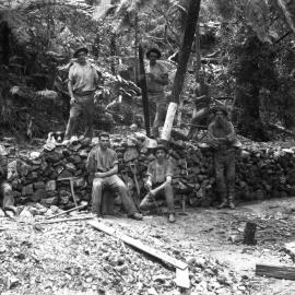 A group of seven miners at Record Reign Mine, 1897