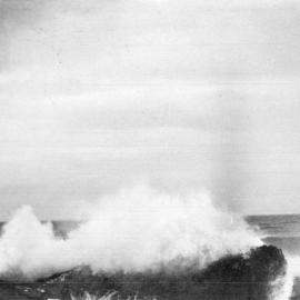 Waves breaking on rocks, c.1912