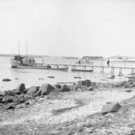 Fishing boat moored at the jetty, c.1925