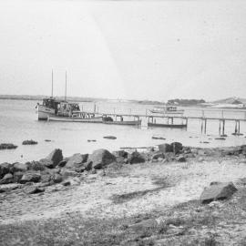 Fishing boat moored at the jetty, c.1925