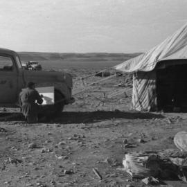 Airman Alan Munro sketching a tent, 1941