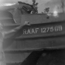 Soldier with R.A.A.F. army duck 127569, 1945