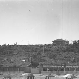 Outside crowd on the hill at the Coffs Harbour Racing Club's inaugural meeting, 7 August 1948