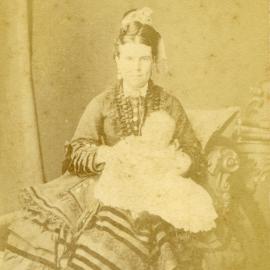 Portrait of a woman with a baby, c. 1874