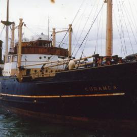 SS Kuranda in Coffs Harbour with northern breakwater in background, 1959 - 1963