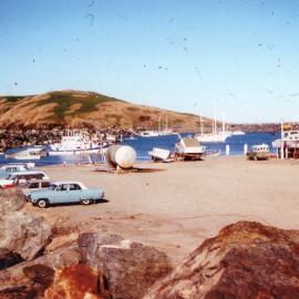 Northern end of Jetty Beach with fishing fleet and yachts inside the inner harbour wall, 1956 - 1960  