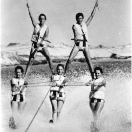 The ballet team of female water skiers in a performance of the Pyramid at North Beach, early 1960s