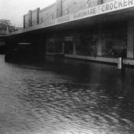 Moonee Street near its junction with High Street after a cyclone, June 1950