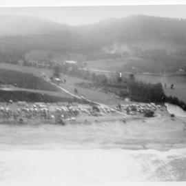 Aerial view of Hills Beach and the Banana Bowl Caravan Park, c. 1960s