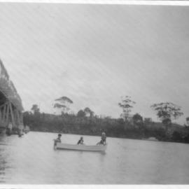 Rob and Hugh Nicol with cousin Lyndal Fowler on the Kalang River between the bridges, 1950s