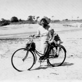 Hugh and Betty Nicol with their bike on Park Beach, c. 1945