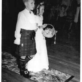 Page boy Hugh Nicol and flower girl Robin Bailey at the Scottish Ball in the School of Arts, July 1953